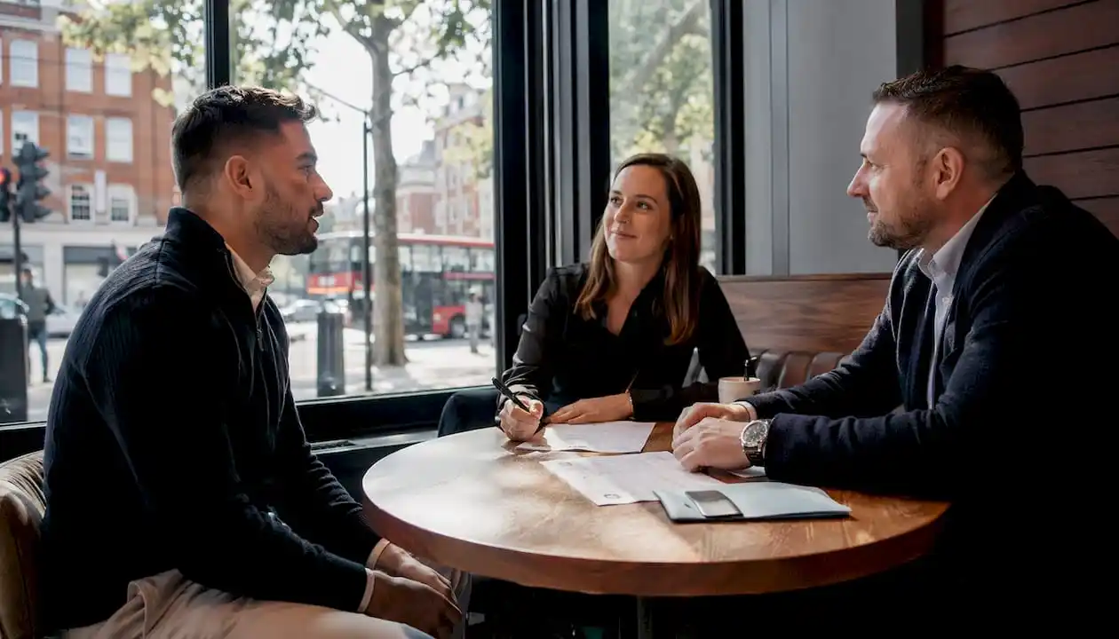 Security job interview with references on table