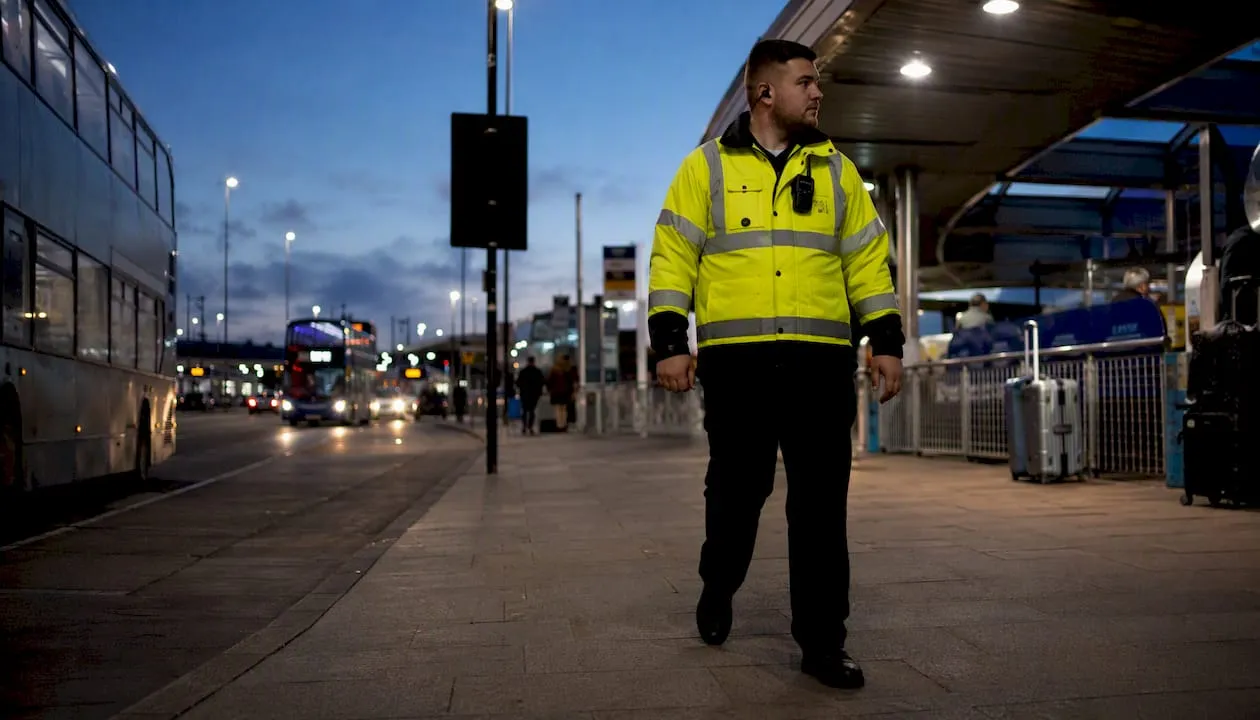 UK security guard on patrol outside retail store