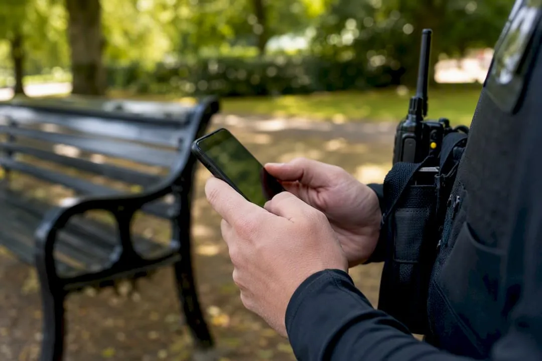 Hands preparing to search company jobs on phone
